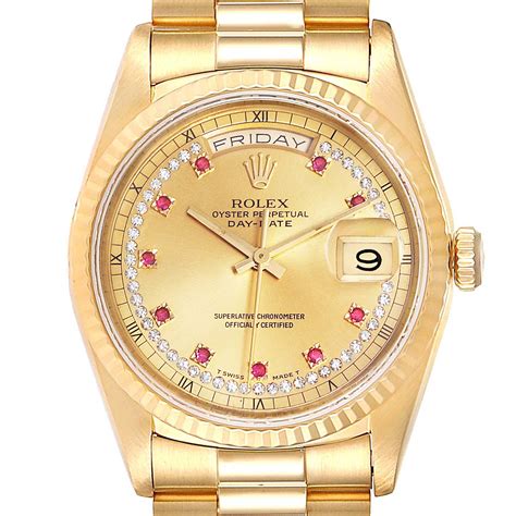 rolex day date gold dimond dail ruby